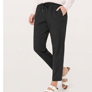 Lululemon On The Fly Pant Woven Women 6 Black Travel Workwear Stretch Athleisure
